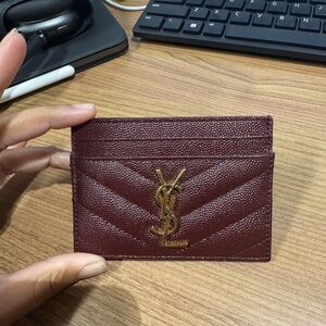Yves Saint Laurent Burgundy Card Holder with Gold Emblem